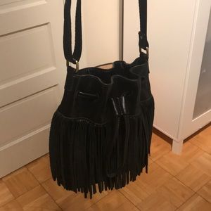Like new FOSSIL fringe drawstring bucket purse